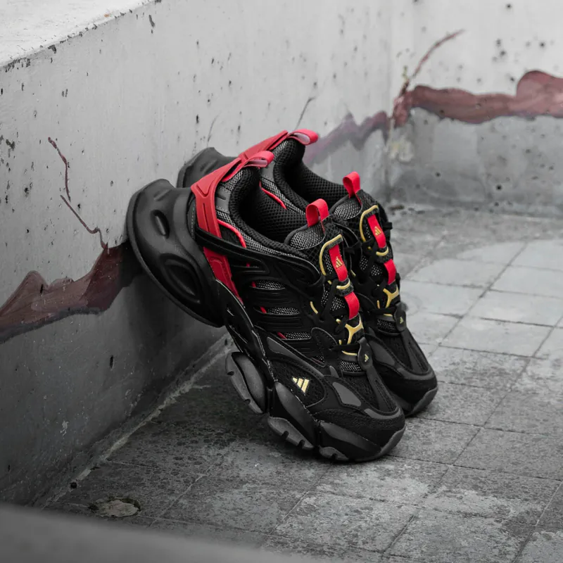 adidas XLG Runner Deluxe Black Gold Metallic Red - Image 2
